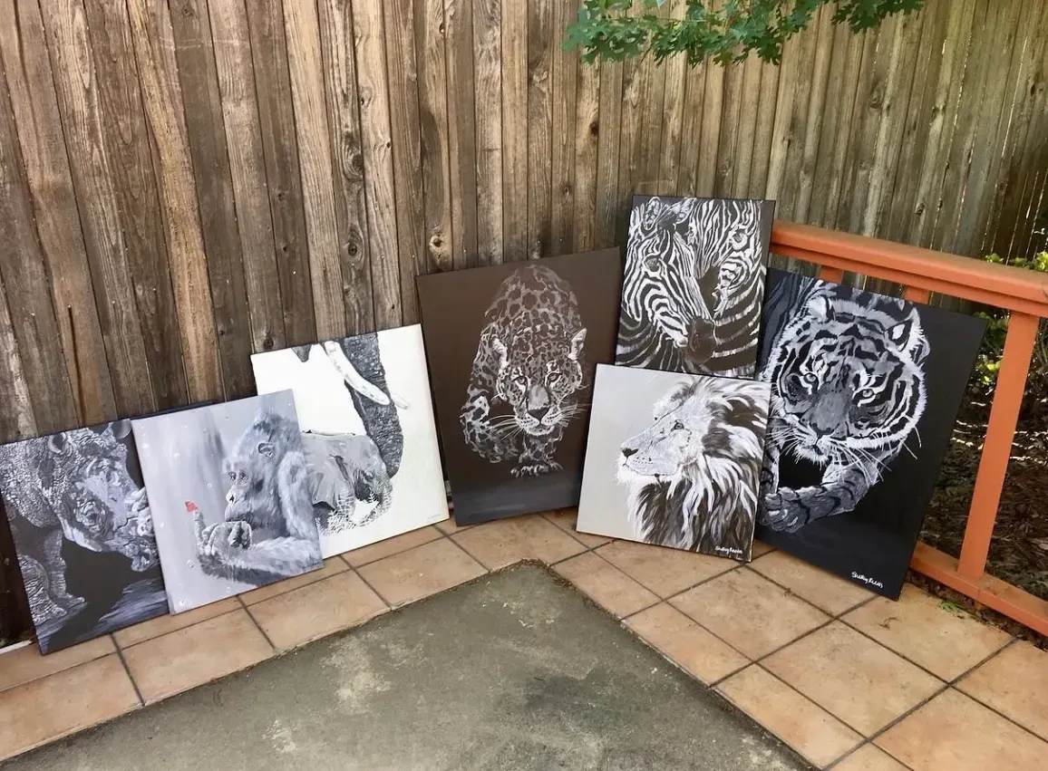 Black-and-white wildlife paintings on canvas