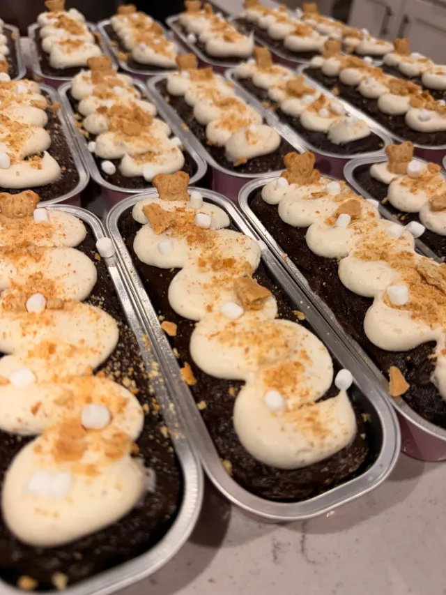 Dessert loaves topped with whipped frosting