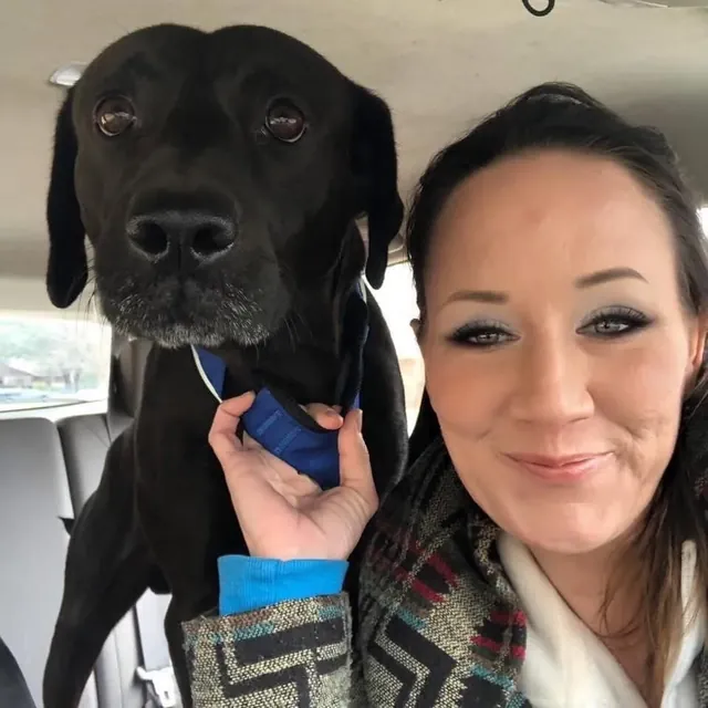 Devon with a black Lab
