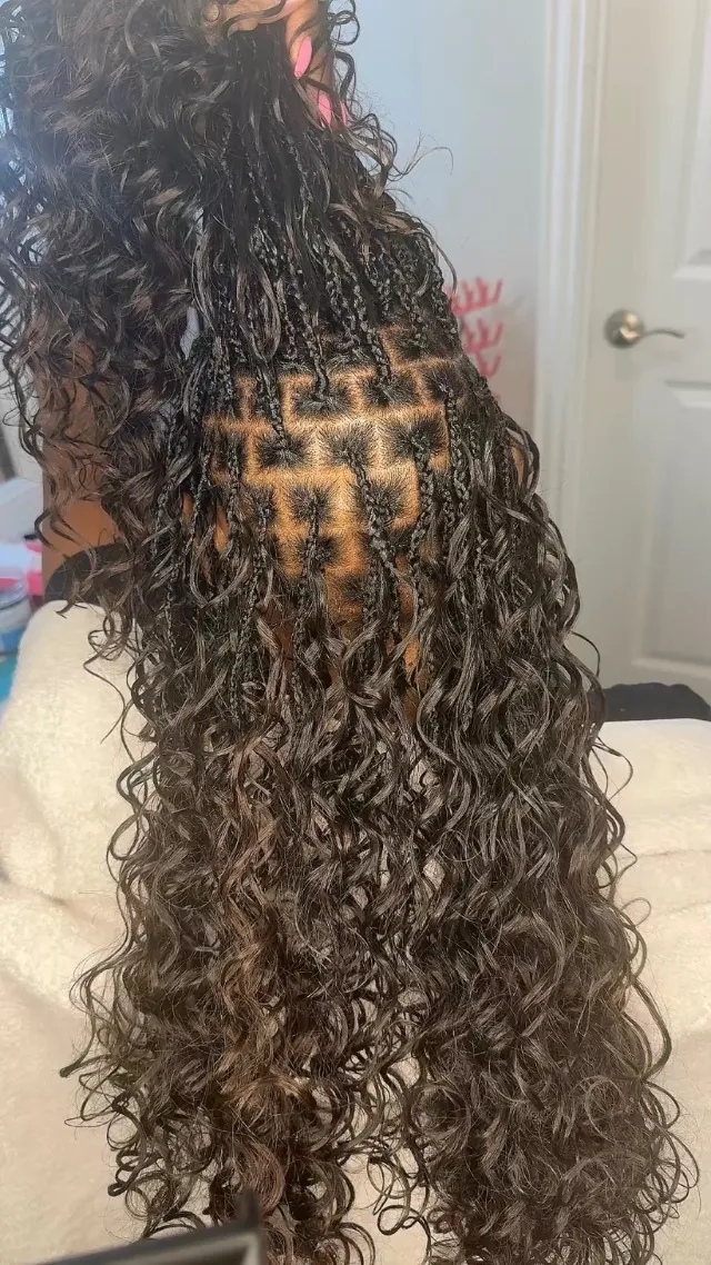 Waist-length curly boho braids, back view