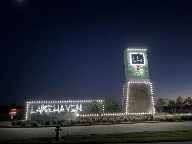 Lakehaven entrance sign lit with white holiday lights