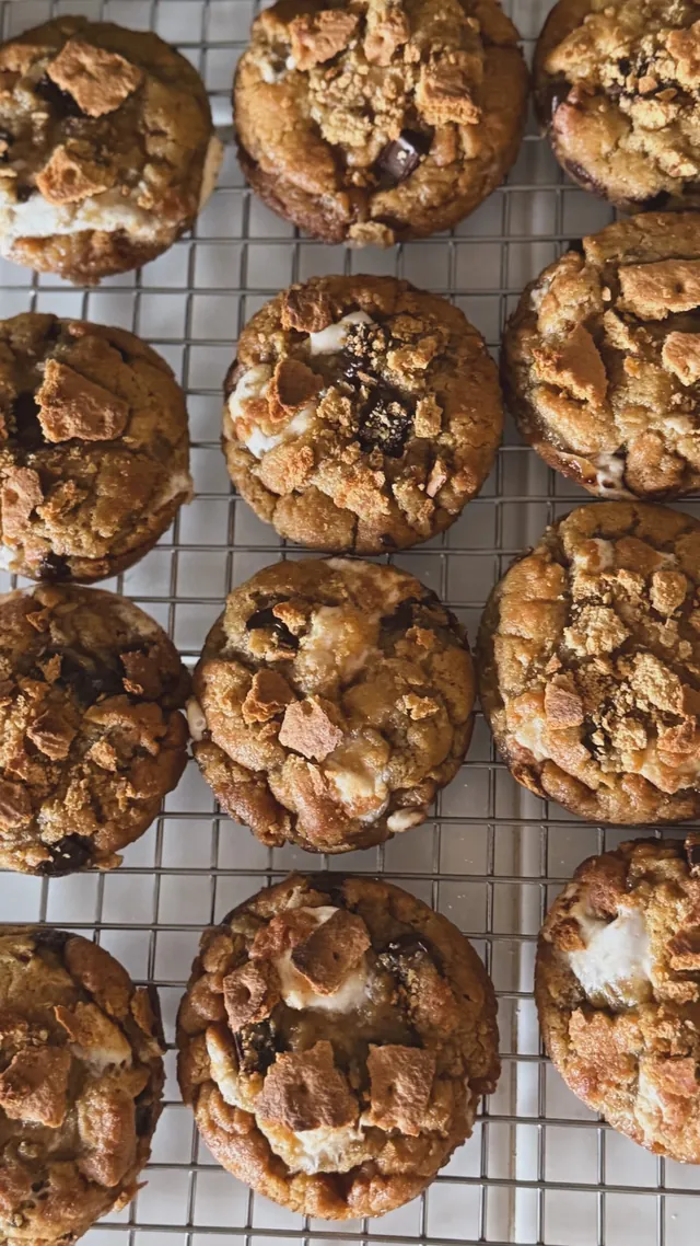 Fresh-baked muffins on a cooling rack